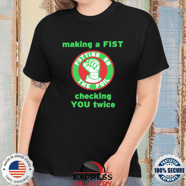 Making A Fist Putting On The Foil Shirt
